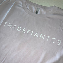 Load image into Gallery viewer, A photo showing a female fit cropped t-shirt. The shirt has the famous ‘The Defiant Co’ logo across the front of the chest.  The shirt has standard sleeves and a round neck.  The shirt is light orchid in colour.