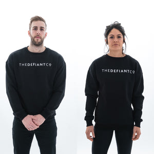 A high-quality Crewneck Sweatshirt for use in the gym and beyond! Crewnecks are absolutely indispensable basics – and this Sweatshirt is a firm favourite for its soft wearing comfort. The crewneck is a standard unisex fit and has the Famous The Defiant Co logo embossed across the chest. The colour is black.