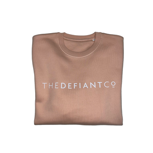 A high-quality Crewneck Sweatshirt for use in the gym and beyond! Crewnecks are absolutely indispensable basics – and this Sweatshirt is a firm favourite for its soft wearing comfort. The crewneck is a standard unisex fit and has the Famous The Defiant Co logo embossed across the chest. The colour is peach.