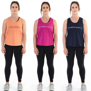 A photo collage showing the variations available in The Defiant Co Tank Top.  The tanks are a little oversized making them perfectly breathable for workouts but also making them suitable for every day life.  The tanks have the famous The Defiant Co logo embossed across the centre of the chest and are available in volcanic stone, orchid flower and navy blue.