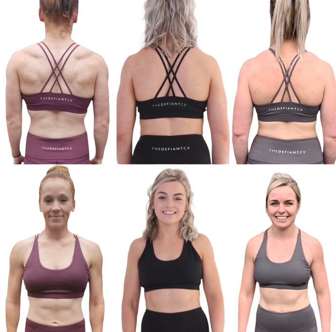 A photo showing a collage of The Defiant co Performance Sports Bras that are currently in the sale! They have standard front and crossed back with the famous The Defiant Co logo just below on the back. The photo shows the 3 colours available, burgundy, black and charcoal.