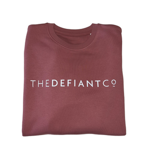 A high-quality Crewneck Sweatshirt for use in the gym and beyond! Crewnecks are absolutely indispensable basics – and this Sweatshirt is a firm favourite for its soft wearing comfort. The crewneck is a standard unisex fit and has the Famous The Defiant Co logo embossed across the chest. The colour is mauve.