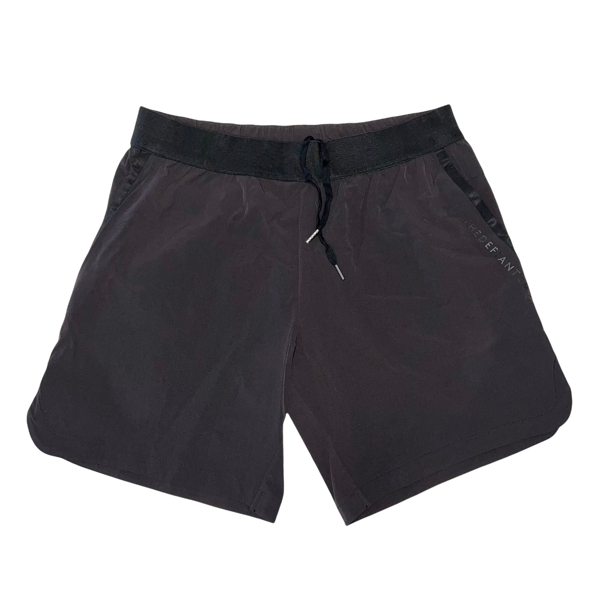 A photo of the best selling The Defiant Co Performance Shorts.  The shorts have a black elasticated waistband with draw strings and have The Defiant Co logo down the left leg.  The shorts have two pockets, one either side and are the colour charcoal.